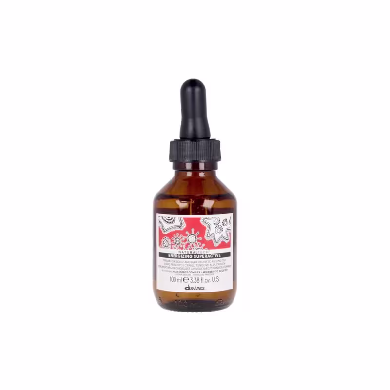 Frasco de vidro âmbar com conta-gotas preto contendo um produto de beleza Davines com rótulo vermelho e branco, indicando ser um "Energizing Superactive" para cabelo e couro cabeludo.