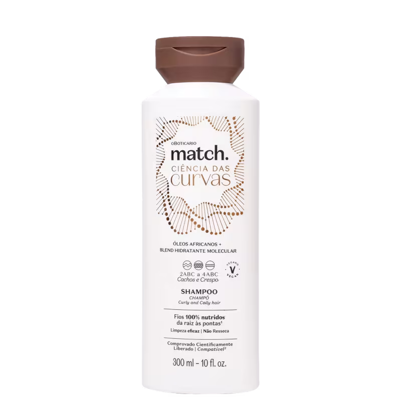 Frasco branco de shampoo da linha Match., com rótulo destacando a "Ciência das Curvas" e ingredientes à base de óleos africanos e blend hidratante molecular. Embalagem com tampa marrom e informações sobre o produto em português.