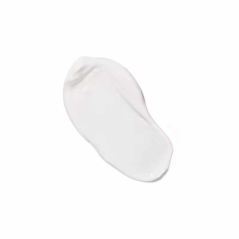 Não há rótulos ou texto visível. O produto tem um design minimalista e clean, com uma cor branca imaculada que transmite uma sensação fresca e natural.