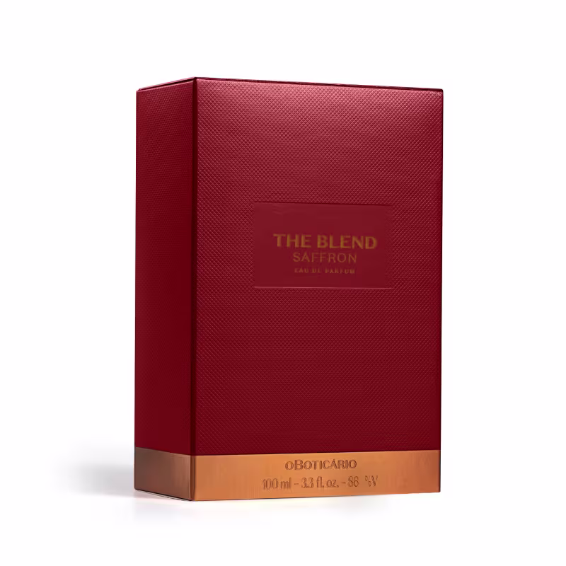 Caixa vermelha com textura de contendo a fragrância "The Blend Saffron" da marca O bolicario. A caixa possui o nome do produto e a marca impressos em dourado.