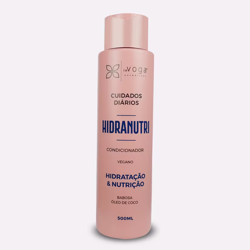 Frasco rosa de 500ml do condicionador Hidranutri da marca In Voga, com rótulo destacando os benefícios de hidratação e nutrição para os cabelos, além de mencionar que o produto é vegano.