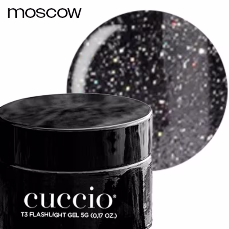 Gel para construção de unhas com o nome "T3 Flashlight Gel 5G" impresso no frasco preto. O frasco é redondo e possui uma tampa preta. Ao lado do frasco, há uma esfera brilhante e translúcida, que parece ser uma amostra do produto.