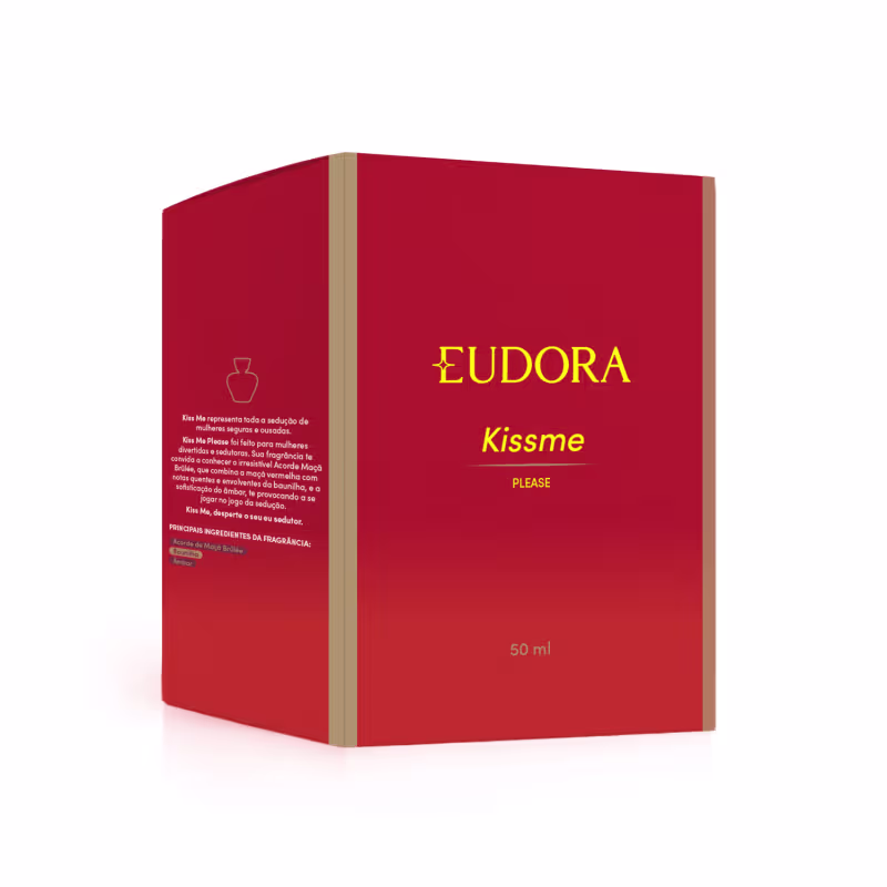 A caixa vermelha do produto Eudora Kiss Me Please. A caixa possui o nome da marca em letras douradas e o nome da linha abaixo. A embalagem possui um design simples e minimalista, com a cor vermelha predominante.