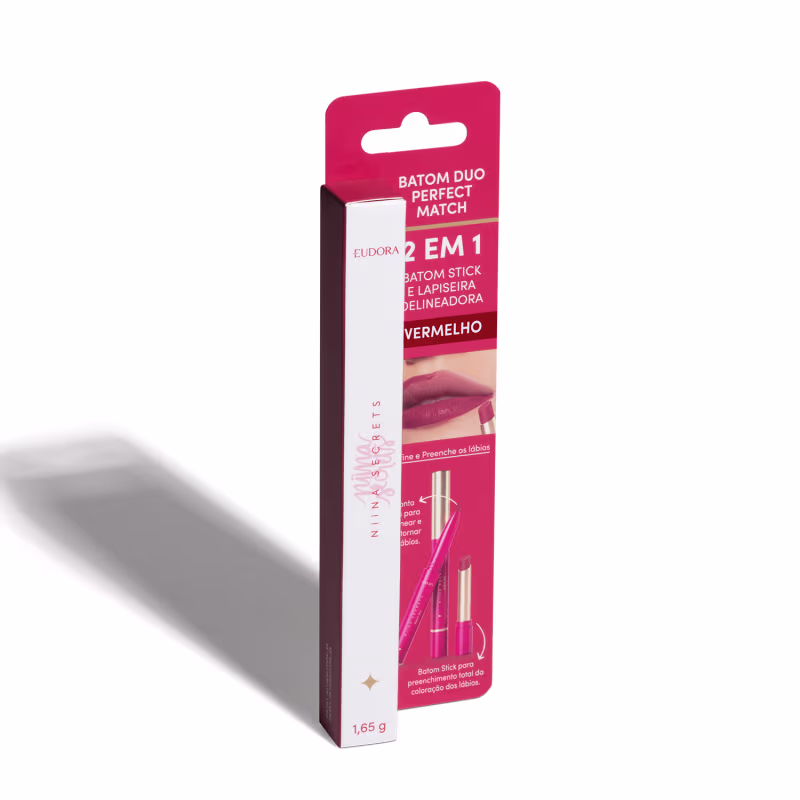 Embalagem do produto "Batom Duo Perfect Match" da marca Niina Secrets, com a embalagem em rosa e branco. O rótulo indica a descrição "2 em 1 Batom Stick e Lapiseira Delineadora".