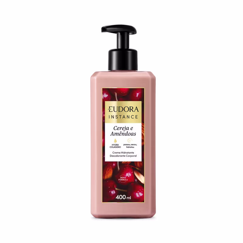 Frasco de creme hidratante desodorante corporal da marca Eudora Instance, com rótulo destacando os ingredientes cereja e amêndoas. Embalagem de plástico com bomba dosadora preta, em tons de rosa e vermelho.