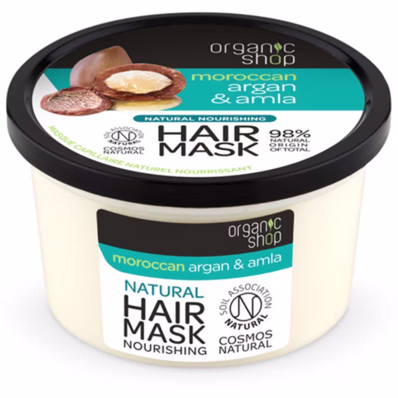 A imagem mostra uma máscara capilar em pote transparente com tampa preta e rótulo branco com detalhes em azul.