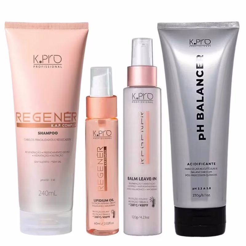 Conjunto de produtos de cuidados capilares da marca K.pro, incluindo shampoo, leave-in e óleo capilar em embalagens de plástico nas cores rosa e branco. Também conta com tubo de acidificante pH Balancer.
