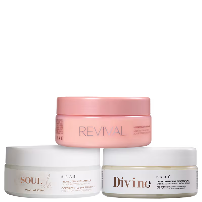 Três potes de tratamento capilar da marca Braé. Um rosa com a inscrição "Revival" na parte frontal. Dois potes brancos, um com a inscrição "Soul Color" e o outro com "Divine". Os potes têm formatos cilíndricos e tampas da mesma cor que o corpo.