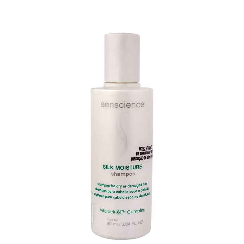 Shampoo Silk Moisture da Senscience. Frasco plástico branco opaco com tampa da mesma cor. Rótulo com texto em verde escuro "Silk Moisture shampoo" e descrição em inglês e outras línguas.