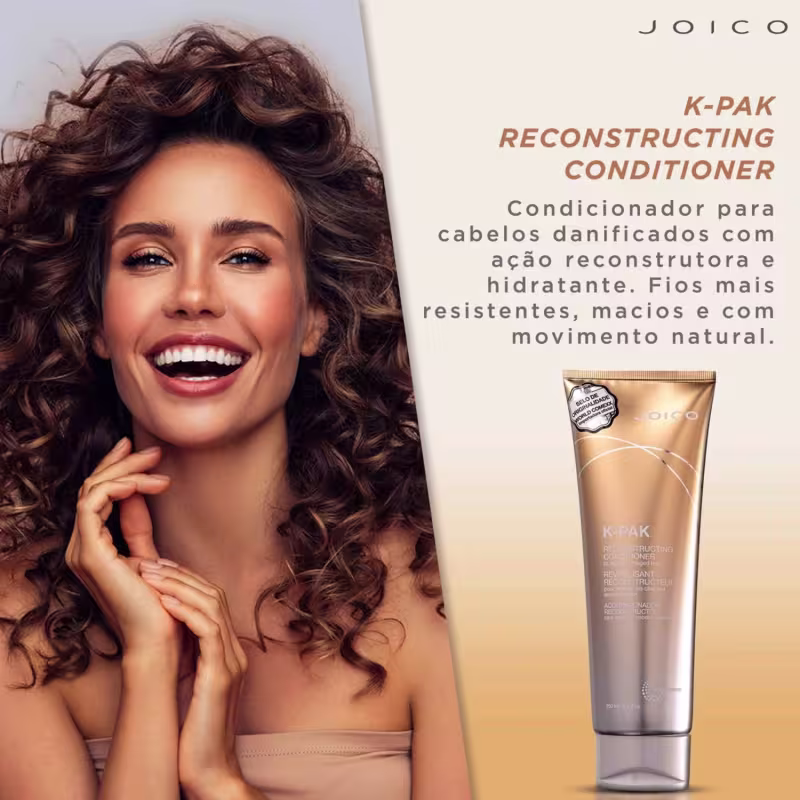 O produto apresentado é um condicionador para cabelos danificados da linha K-Pak da marca Joico. A embalagem é um tubo plástico dourado com detalhes em branco.
