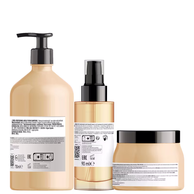 A imagem mostra três produtos da linha Absolut Repair da L'Oréal Professionnel: um frasco de shampoo, um frasco de óleo de reparação e um pote de tratamento condicionante.