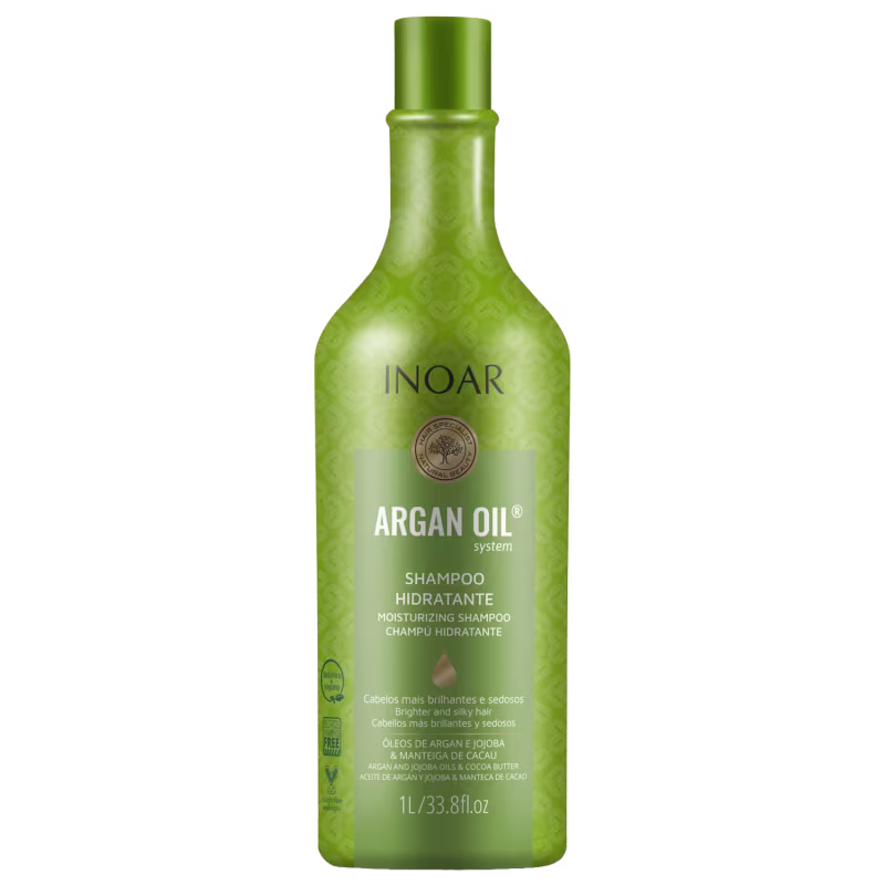 Shampoo hidratante da linha Argan Oil da marca Inoar. Embalagem em frasco plástico verde transparente com detalhes em relevo. Rótulo com o nome do produto "Argan Oil System Shampoo Hidratante".
