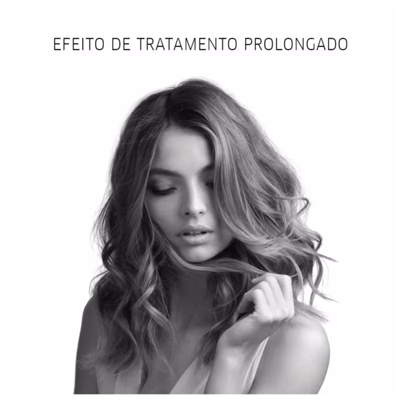 A imagem mostra uma mulher jovem com cabelos longos e ondulados em tons acinzentados. Ela tem os olhos fechados e uma expressão serena. O texto na parte superior diz "Efeito de Tratamento Prolongado" em português.