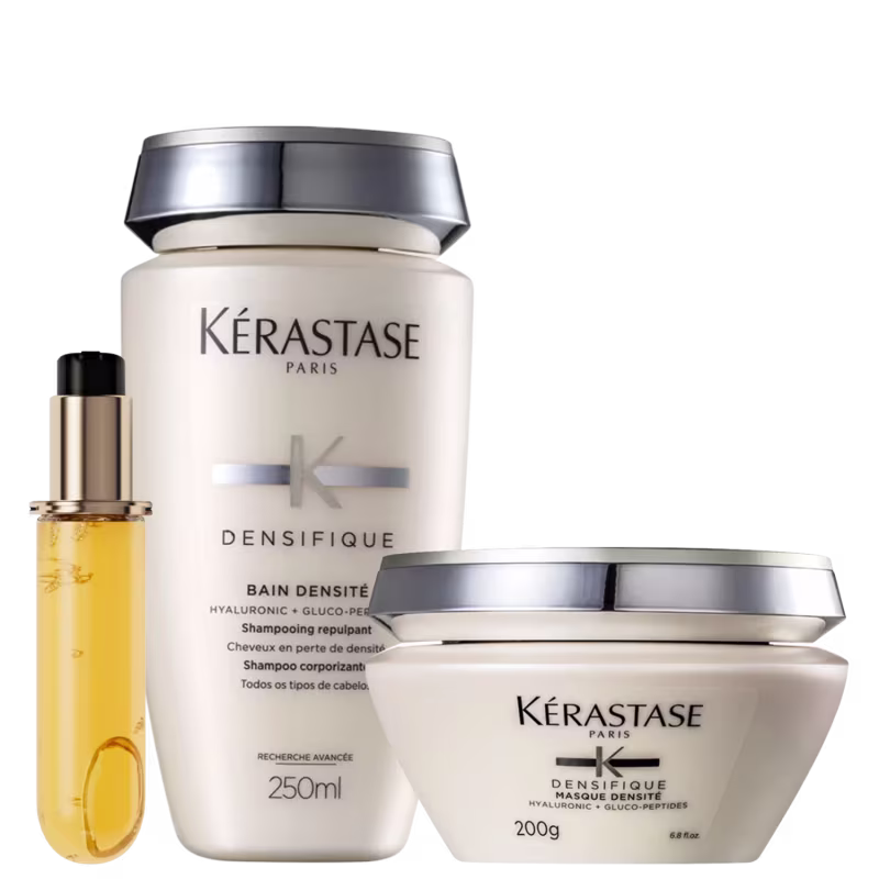 A imagem mostra três produtos da marca Kérastase. Shampoo Densifique de 250ml, máscara capilar Densifique de 200g e um óleo capilar Elixir Ultime, versão refil de 75ml. As cores predominantes são branco, prata, dourado e preto.