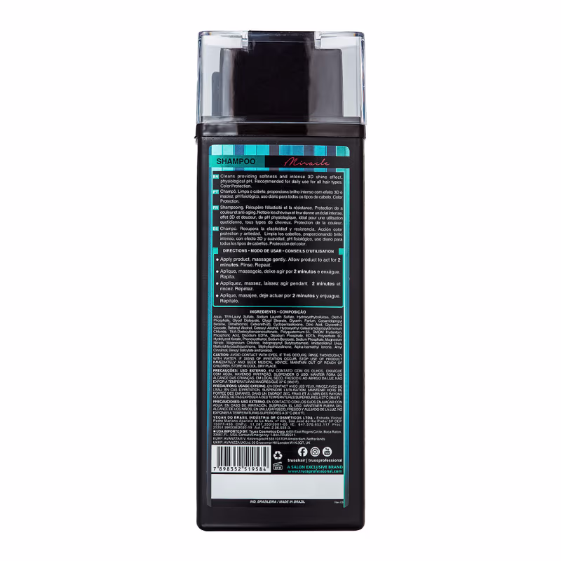 A imagem mostra o verso do frasco do shampoo com informações sobre o produto.