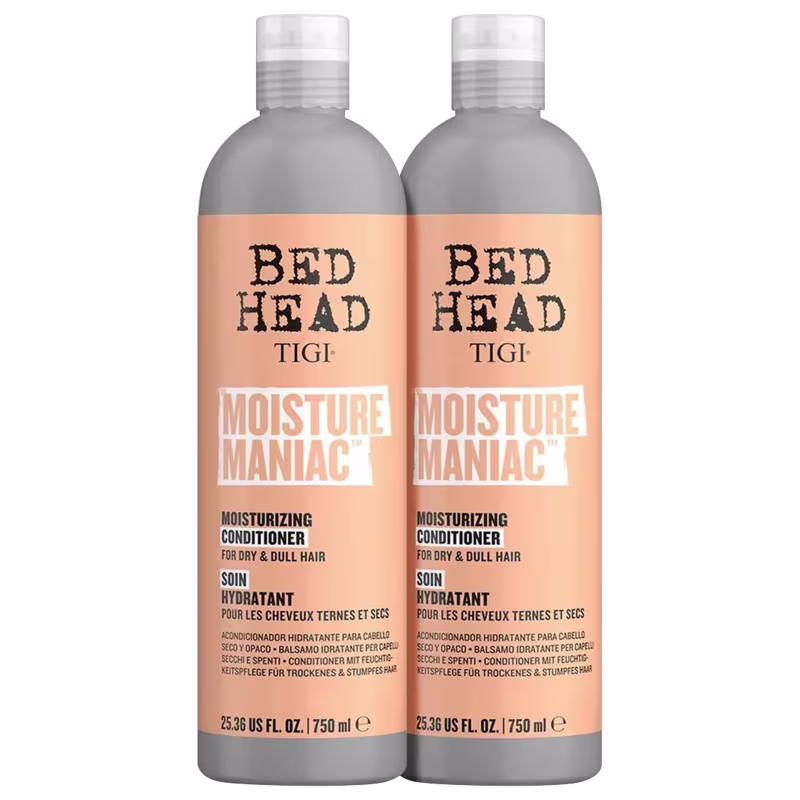 Dois frascos de condicionador hidratante da linha Bed Head da TIGI, com rótulos em tons de laranja e cinza, apresentando o nome "Moisture Maniac" e informações sobre o produto.