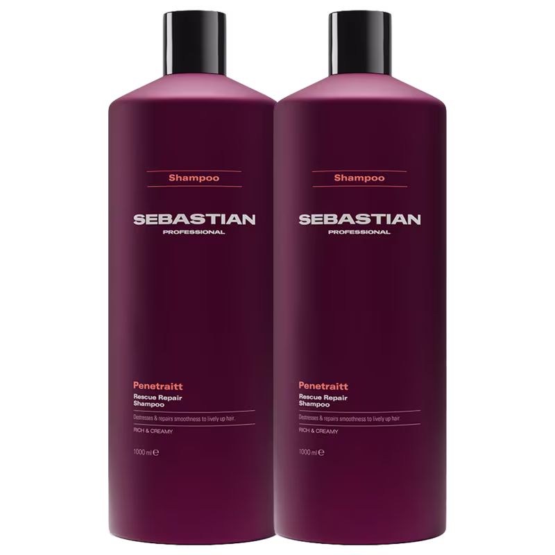 Dois frascos de shampoo da marca Sebastian Professional, na cor vinho escuro, com rótulos destacando o nome da marca e o nome do produto "Penetraitt Rescue Repair Shampoo".