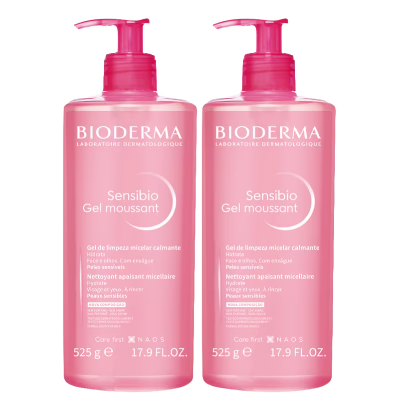 Dois frascos de gel de limpeza facial da marca Bioderma, com embalagem rosa e rótulos em inglês e francês indicando o produto "Sensibio Gel moussant" para peles sensíveis.