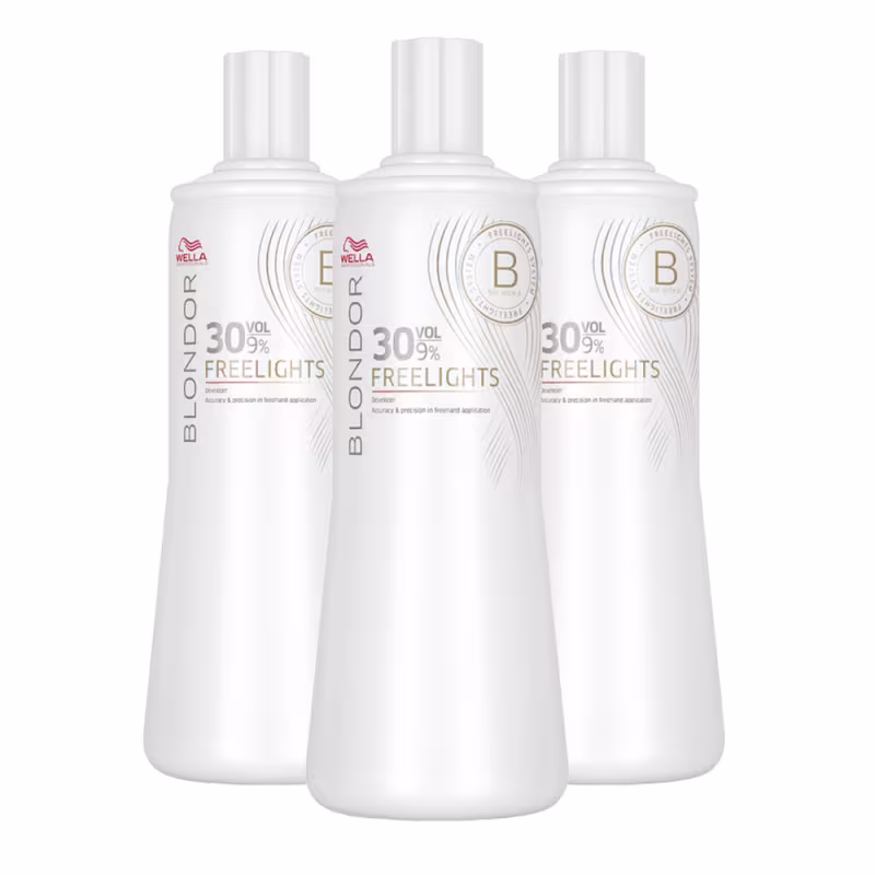 Três frascos brancos da linha Wella Professionals Blondor, contendo 30 volumes de Freelights, um produto para clarear e iluminar os cabelos.