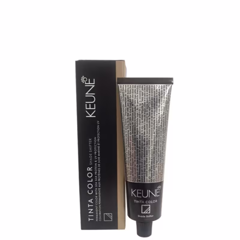 Tinta color da marca Keune, em embalagem preta e cinza, contendo um tubo de creme colorante para cabelos. O rótulo apresenta o nome da marca e do produto de forma clara e objetiva.