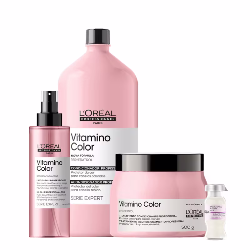 um frasco grande, um menor com borrifador, um pote de tratamento de 500g e um frasco pequeno com concentrado. Todas as embalagens são rosa claro, exceto a última, e exibem o logo da marca e o nome da linha.