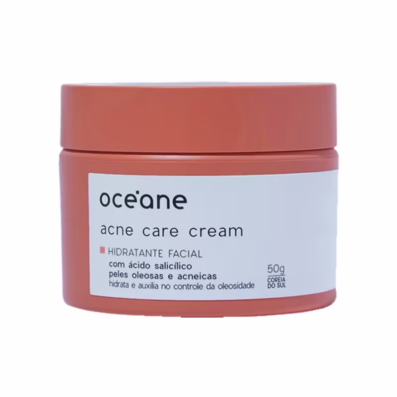 A imagem mostra a embalagem do creme hidratante facial Océane Acne Care Cream. O produto vem em um pote de plástico na cor terracota com um rótulo branco e letras pretas descrevendo nome, marca e ativos.