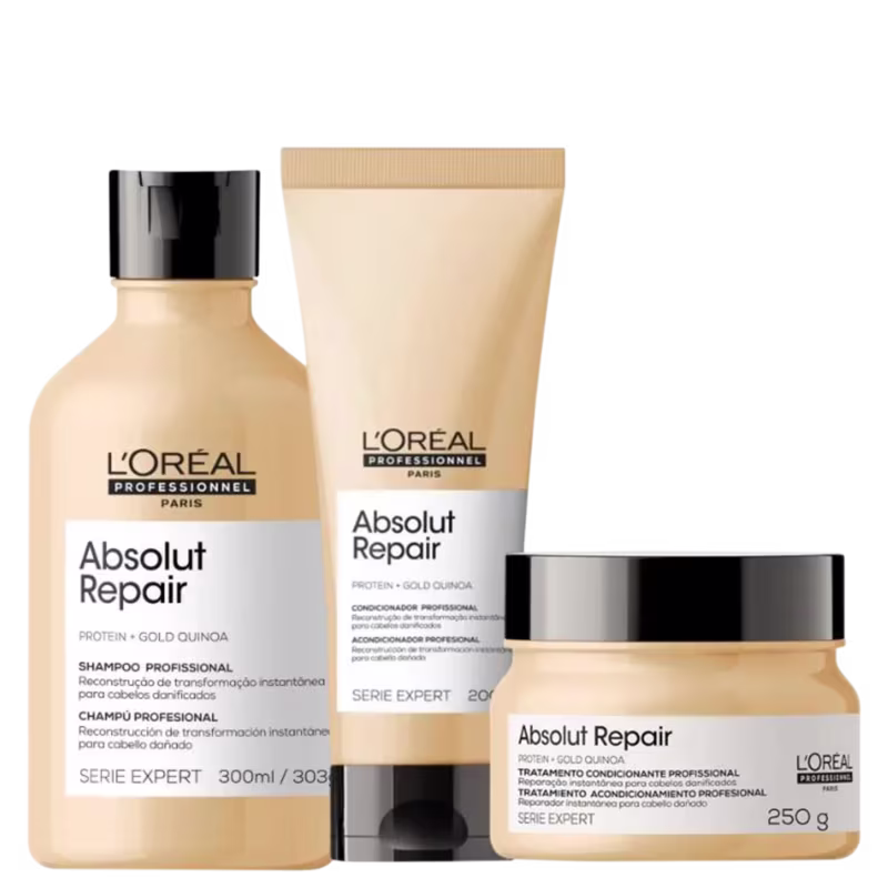 A imagem mostra um kit da linha Absolut Repair da L'Oréal Professionnel, com um frasco de shampoo, uma bisnaga de condicionador e um pote redondo de máscara, todos de cor bege com rótulo branco e tampa preta.