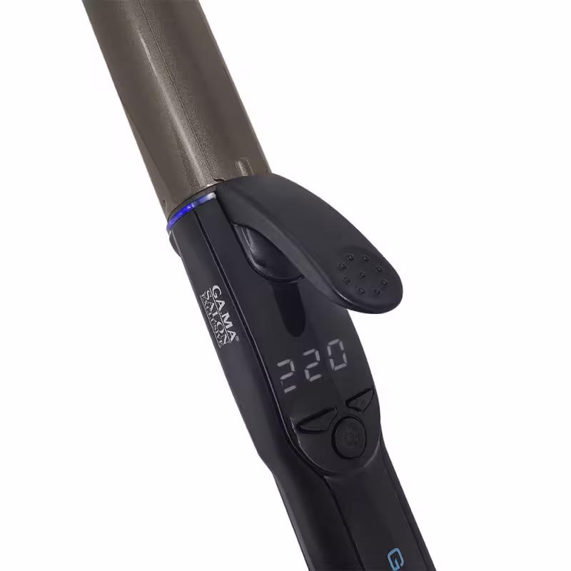 A imagem mostra o visor do modelador de cachos. Ele possui um design ergonômico em plástico preto com detalhes em azul. Abaixo do visor, existem botões de controle para ajustar as configurações.