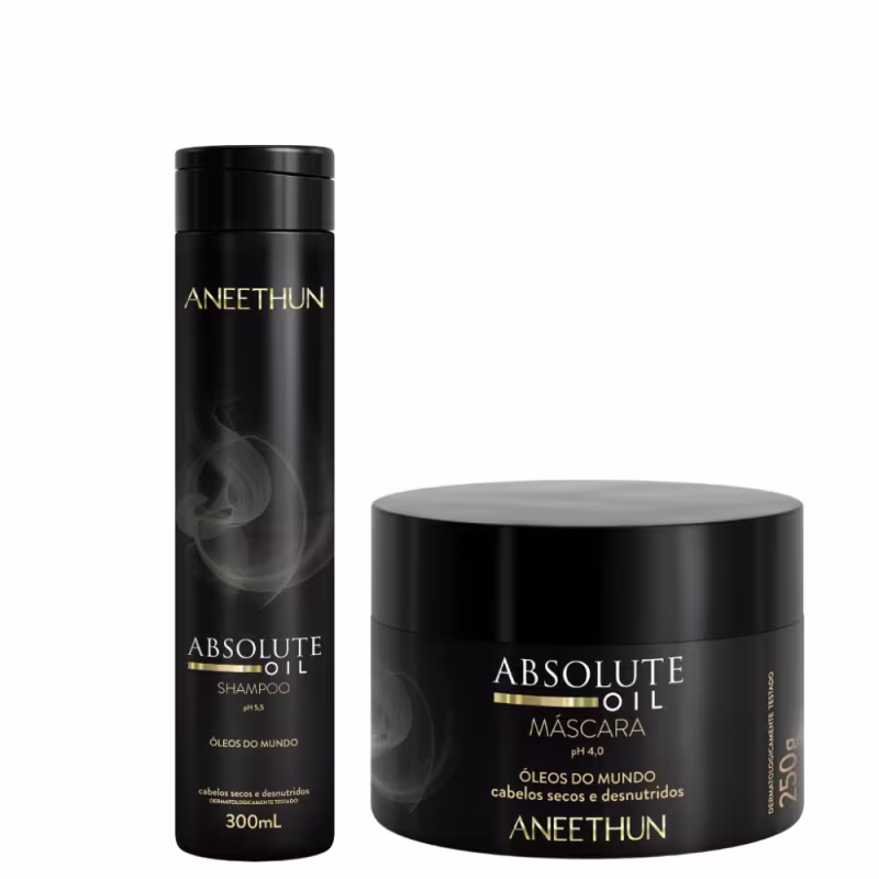 O kit apresenta um shampoo e uma máscara capilar da marca Aneethun, chamado "Absolute Oil". A embalagem é preta com o nome da marca e do produto em letras douradas.