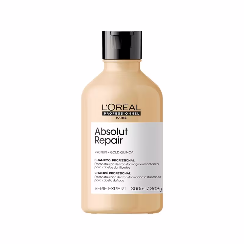 É um shampoo profissional da linha Absolut Repair da L'Oréal Professionnel. A embalagem é uma garrafa plástica transparente de cor bege claro com tampa preta brilhante.
