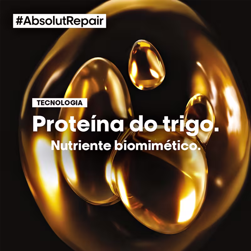 A imagem mostra cápsulas douradas brilhantes em formato de gota, aparentemente uma formulação de proteína do trigo, descrita como um "nutriente biomimético" na tecnologia AbsolutRepair. As cápsulas douradas refletem a luz.