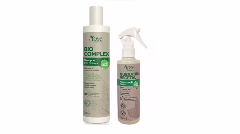 Dois produtos da marca Apise Cosméticos: um frasco branco de Shampoo Bio Complex de 300ml e um frasco spray de Queratina Vegetal de 200ml, ambos com rótulos verdes indicando ingredientes naturais e veganos.