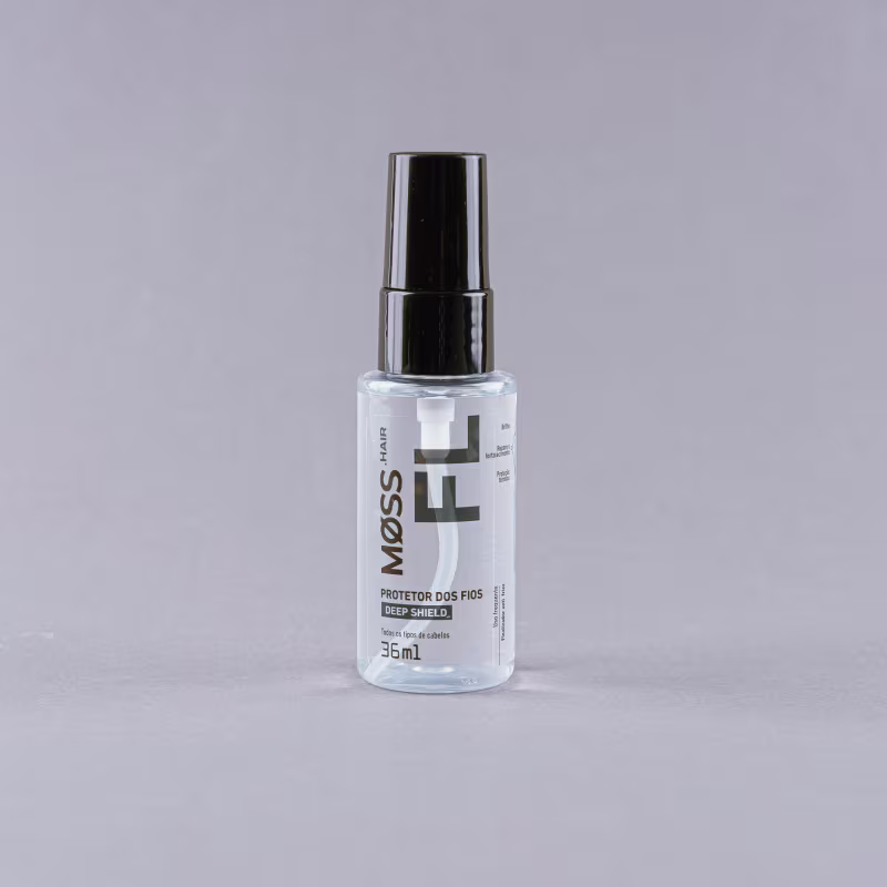 A imagem mostra o frasco do condicionador em um fundo cinza.