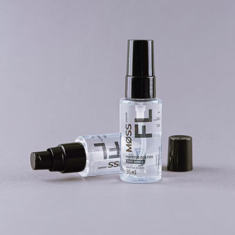 A imagem mostra dois frascos do reparador de pontas. Um frasco está na vertical e atrás dele há um frasco semelhante na horizontal e destampado.