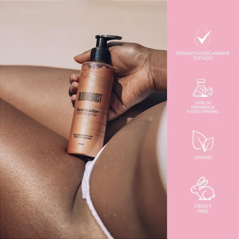 Close do colo de uma mulher negra, segurando o frasco iluminador corporal, destacando sua pele iluminada e bem-cuidada. O texto mostra que o produto é dermatologicamente testado, livre de parabenos, além de ser vegano e cruelty free