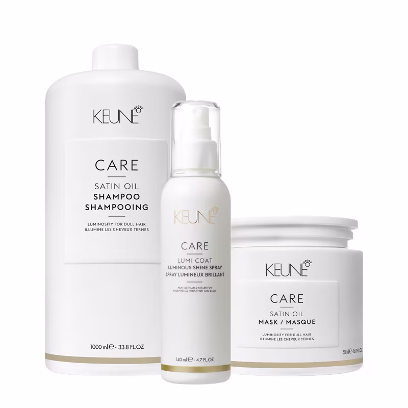 Produtos de cuidados capilares da marca Keune, incluindo shampoo Satin Oil, spray de brilho Lumi Coat e máscara Satin Oil, em embalagens brancas com detalhes dourados.