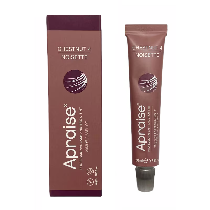 Produto de coloração para cílios e sobrancelhas. Um tubo de plástico marrom contendo 20ml, ao lado de uma caixa retangular marrom escuro com o mesmo nome e cor do produto.