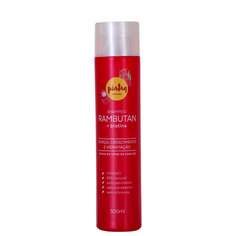 Shampoo Rambutan da marca Piatan Natural. Embalagem cilíndrica vermelha de 300ml. Rótulo com o nome do produto "Shampoo Rambutan + biotina" em letras brancas e amarelas.