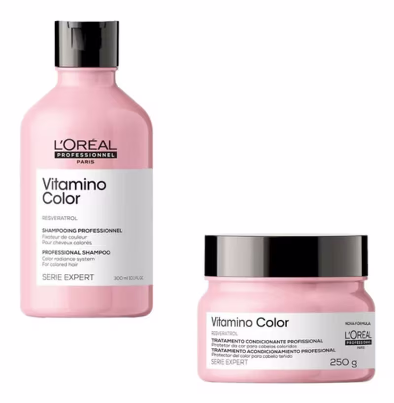 A imagem mostra dois produtos de cuidados capilares da linha Vitamino Color da L'Oréal Professionnel. Um é um shampoo em um frasco plástico rosa de 300ml e o outro é uma máscara capilar em um pote rosa de 250g.
