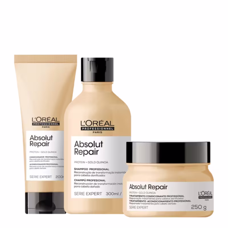 A imagem mostra três produtos da linha Absolut Repair da L'Oréal Professionnel. Um shampoo em uma embalagem plástica cilíndrica amarela de 300ml. Outro é um condicionador em uma embalagem tubular. O terceiro é uma máscara em um pote de 200g.