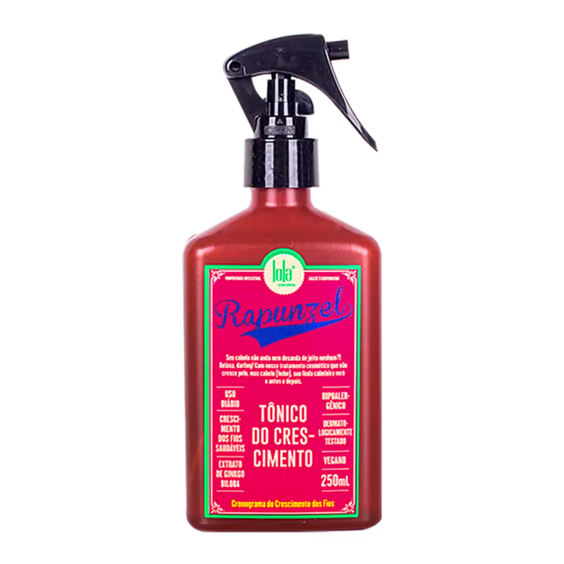 A imagem mostra o tônico de crescimento, seu frasco é retangular e possui uma tampa preta de válvula spray.