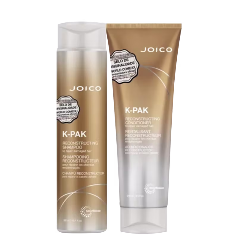 Dois produtos de cuidados capilares da marca Joico: shampoo e condicionador K-PAK com frasco branco e dourado. Ambos os produtos têm rótulos com o nome do produto, descrições e o selo "Selo de Confiabilidade World Confixx" visível.