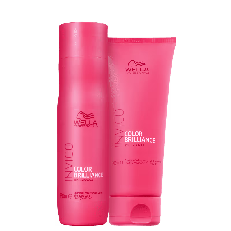 A imagem mostra um shampoo em um frasco cilíndrico rosa de 250ml e um condicionador em um tubo rosa de 200ml. Ambos os produtos têm o logotipo da Wella e as informações do produto impressas nas embalagens na cor branca.