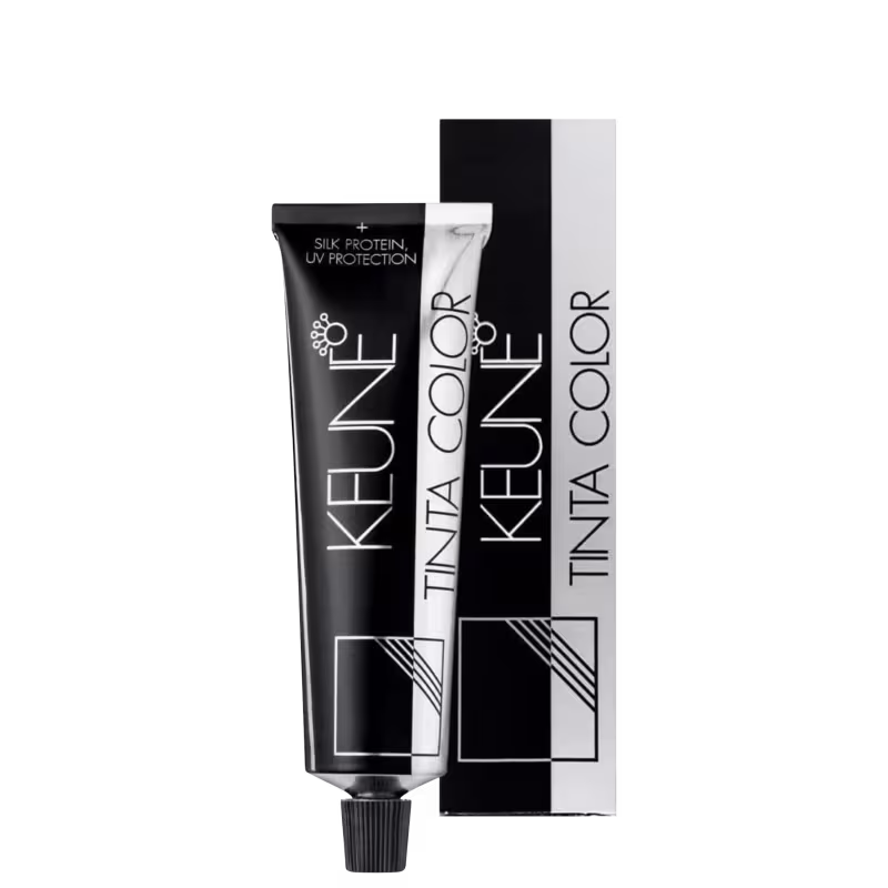 Produto de coloração permanente para cabelos Tinta Color da marca Keune. Embalagem retangular preta com detalhes em branco contendo o nome do produto e da marca.