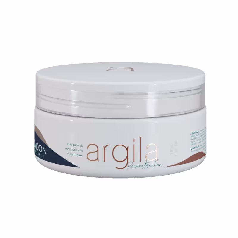 Máscara de reconstrução instantânea. A embalagem é um pote branco com tampa, exibindo o nome da marca "Argila" em letras marrons. Não há nenhuma imagem ou identificação de pessoas na embalagem, apenas o design e informações sobre o produto.