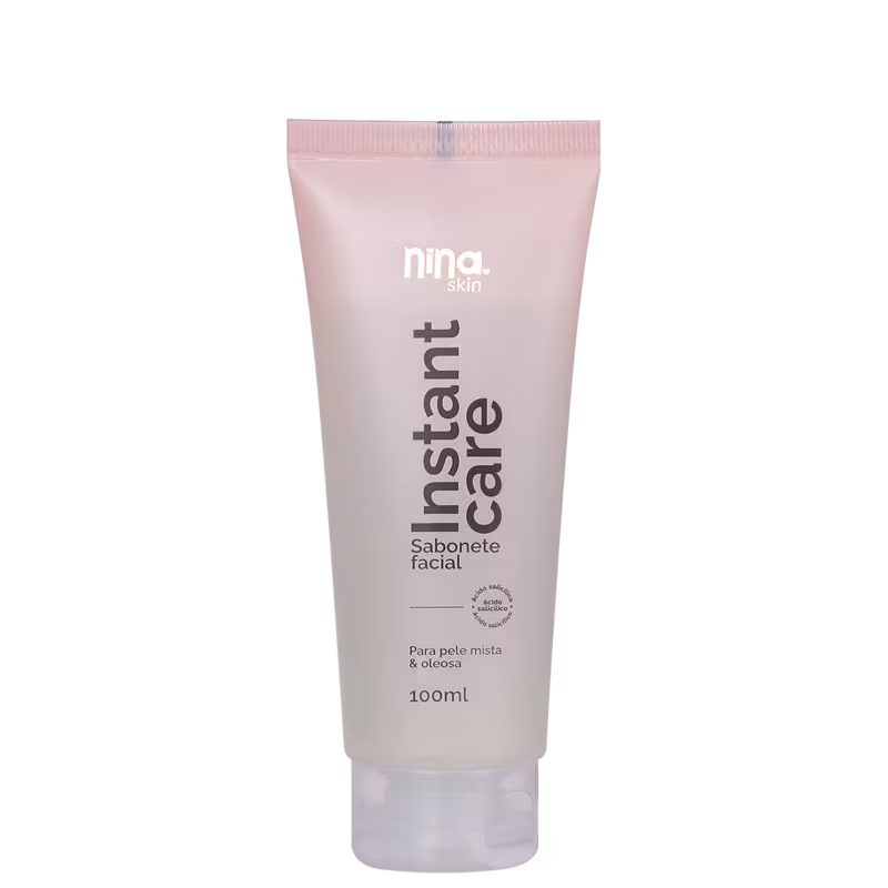 A imagem mostra o sabonete facial  Instant Care de Nina Makeup. Seu frasco é tubular na cor rosada.