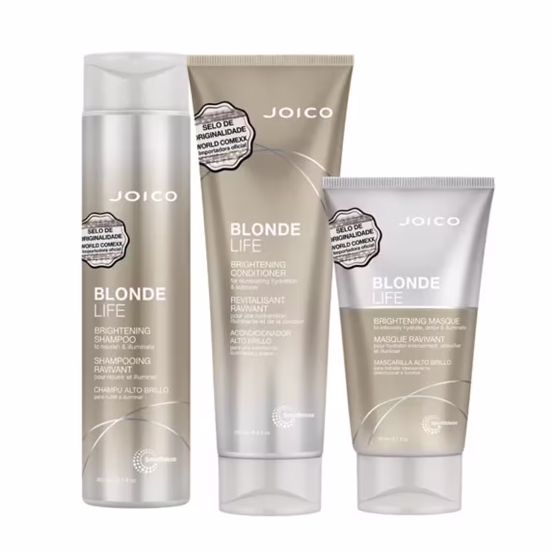 A imagem mostra três produtos de cuidados capilares da marca Joico, da linha Blonde Life. São um shampoo, um condicionador e uma máscara capilar, todos em embalagens de plástico na cor bege, detalhes em branco e prata.