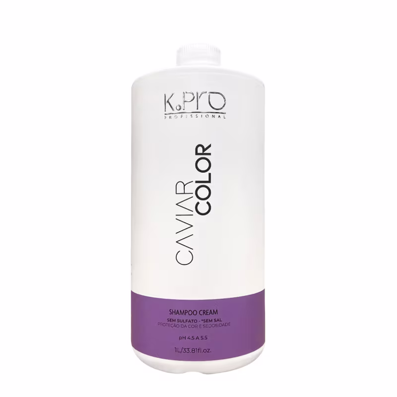 O produto apresentado é um shampoo da marca K.pro Professional. A embalagem é um frasco branco com o nome da marca e o produto "Shampoo Cream" impresso em letras pretas. Volumetria de 1L.