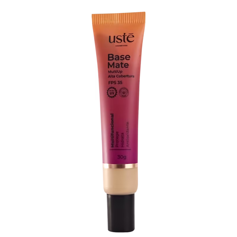 Base Matte da Ustē Cosméticos. Produto de maquiagem em embalagem plástica cilíndrica de cor laranja e rosa. Rótulo indicando FPS 35 e proteção UV. Tubo de 30g com detalhes em preto e dourado na parte inferior.
