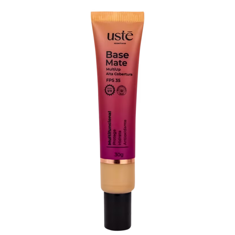 Base Matte da Ustē Cosméticos. Produto de maquiagem em embalagem plástica cilíndrica de cor laranja e rosa. Rótulo indicando FPS 35 e proteção UV. Tubo de 30g com detalhes em preto e dourado na parte inferior.